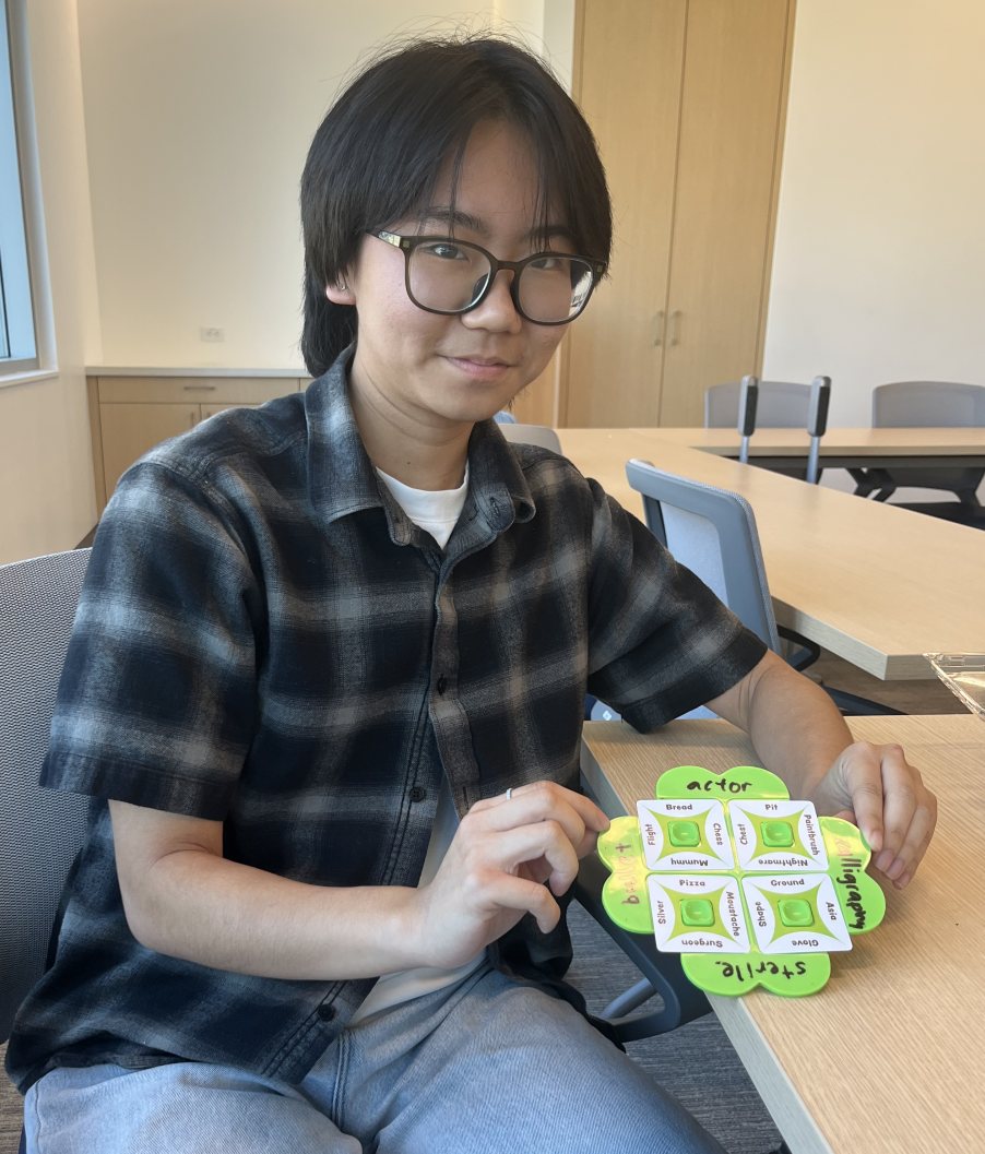 BEDLab member holding a So Clover board
