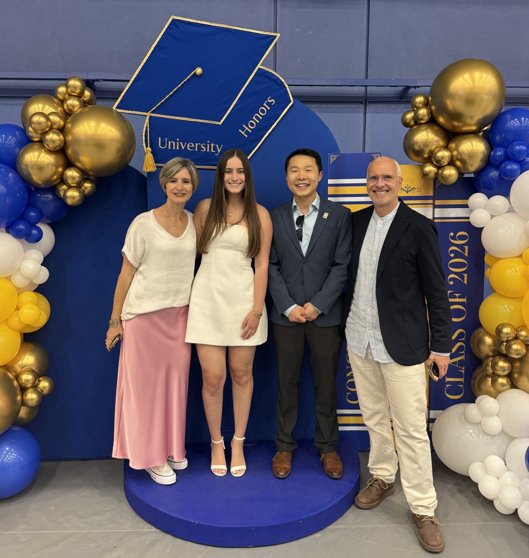 Milena Guidotti with her parents and Professor Li at the University Honors cording ceremony